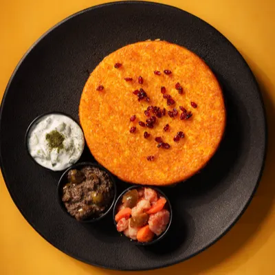 ته چین مرغ و زرشک — کافه رستوران آفتابگردان